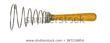 Foto stock: Beautiful Housewife Preparing With Egg Beater