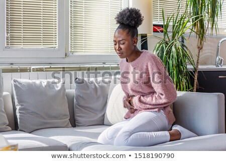 Young African American Woman With Menstrual Pain Zdjęcia stock © Photoroyalty