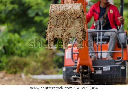 Foto stock: Big And Small Excavators