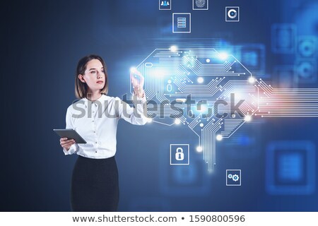Сток-фото: Businesswoman Looking At Tablet And Thinking Deep