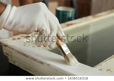 Foto stock: Painting A Window Frame