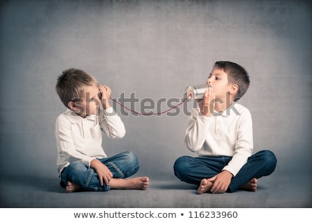 Stok fotoğraf: Young Child With Tin Can Phone