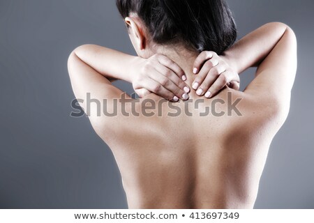 Stockfoto: Fit Brunette With Neck Injury