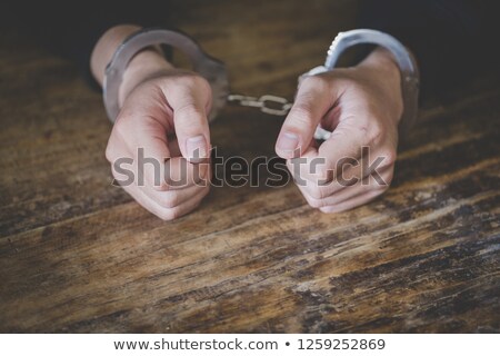 Stock fotó: Prisoner Locked In Handcuffs