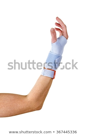 Foto stock: Man With Bent Elbow Wearing Wrist Brace In Studio