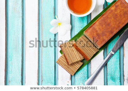 [[stock_photo]]: Traditional Indonesian Sweet Lapis Layer Cake On A Wooden Background