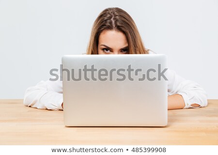 Stock fotó: Young Brunette Woman Hiding Behind Her Laptop