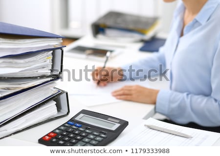 Foto d'archivio: Budget On Office Binder Blurred Image