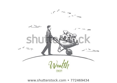 Foto stock: Wheelbarrow With Euro Bills