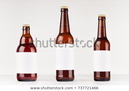 Stockfoto: Three Brown Longneck Beer Bottles 500ml With Blank White Label On White Wooden Board Mock Up