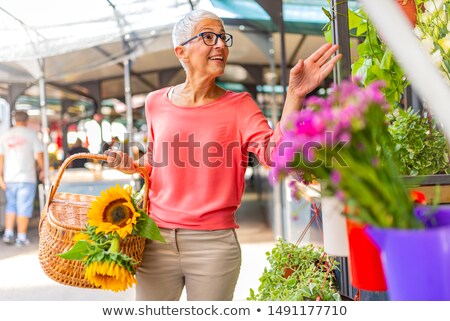 ストックフォト: Portrait Of Senior Woman Sales Flowers On Local Flower Market