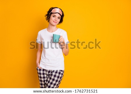 Stock photo: Woman In Pajama And Sleeping Mask Drinking Coffee