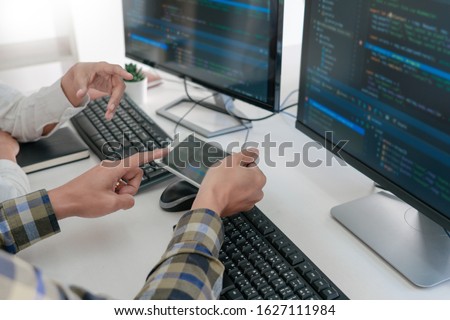 Stock fotó: Pensive Programmer Working On Desktop Pc Programming Code Techno