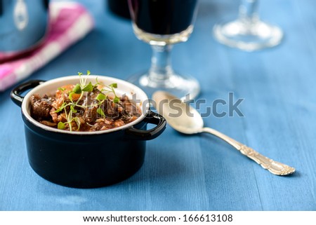 Imagine de stoc: Boeuf Bourguignon Classic French Beef Stew On Blue Table With A