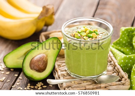 Stock foto: Avocado And Banana Smoothie With Oats With Ingredients In Glass Jar On Wooden Background Healthy Ea