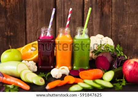 Foto stock: Freshly Squeezed Vegetable Juice In Bottles Useful Vitamin Cock