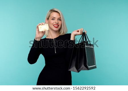 Stock foto: Beautiful Young Woman Posing Isolated Over White Wall Background Holding Lipstick
