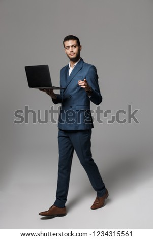 Stok fotoğraf: Full Length Image Of Brunette Arabic Businessman 30s In Formal S