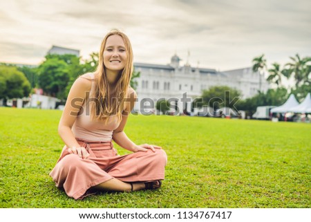 ストックフォト: Woman On The Background Of Old Town Hall In George Town In Penang Malaysia The Foundation Stone Wa