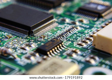 Stok fotoğraf: Printed Green Computer Circuit Board With Many Electrical Componts