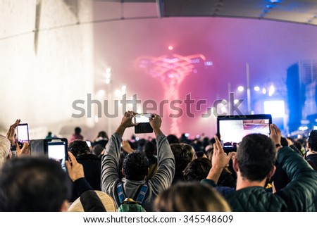 Stockfoto: People Enjoying Rock Concert And Taking Photos With Cell Phone At Music Festival