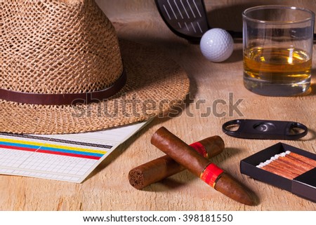 Stock fotó: Siesta - Cigars Straw Hat And Scotch Whiskey On A Wooden Desk