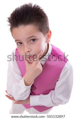 Young Boy Holding His Chin In His First Holy Communion On White Imagine de stoc © BigKnell