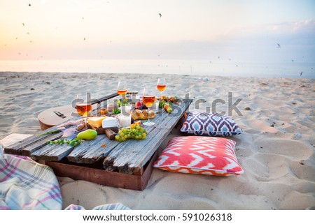 Stock fotó: Picnic On The Beach At Sunset In Boho Style Food And Drink Conc