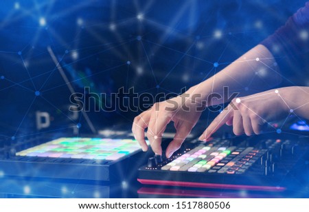 Foto stock: Hand Mixing Music On Midi Controller With Connectivity Concept