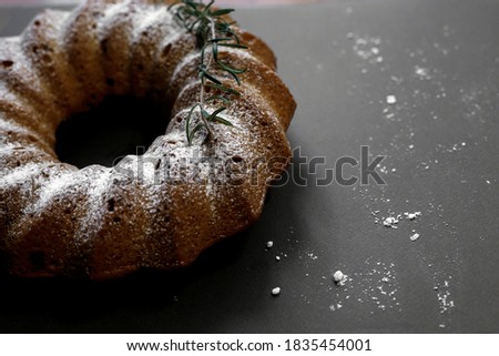 Stock photo: Dark Chocolate Muffins With Sugar Powder On Brown Plate On Rusti
