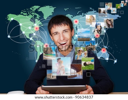 Stock foto: A Technology Man Has Images Flying Away From His Modern Tablet C