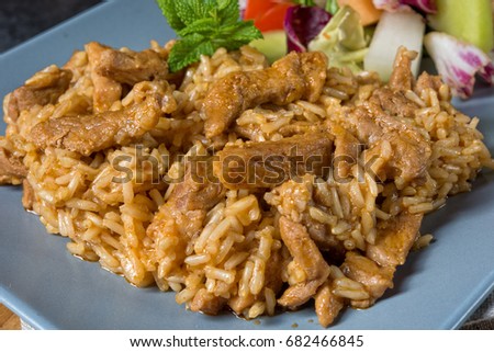 Dishes From Turkey Meat With Rice And Salad Leaves And A Glass O Foto stock © Dar1930