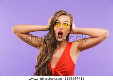 Сток-фото: Photo Of Scared Or Shocked Woman 20s Wearing Red Dress And Sungl