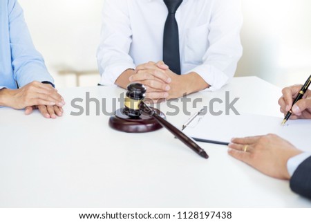 Stock photo: Angry Couple Arguing Telling Their Problems To Judge Gavel Decid