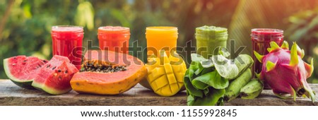 Foto stock: Rainbow From Smoothies Watermelon Papaya Mango Spinach And Dragon Fruit Smoothies Juices Beve