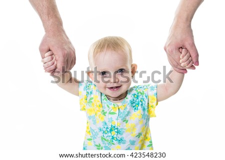 ストックフォト: Baby Taking First Steps With Mother Father Help On White Background