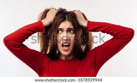 Stock photo: Image Of Stressed Adult Woman Screaming And Grabbing Her Head