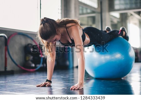 Foto stock: Woman Exercising Fitness Ball