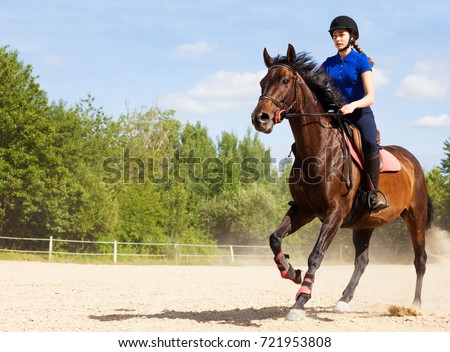 Сток-фото: Female Rider Trains The Horse In The Riding Course