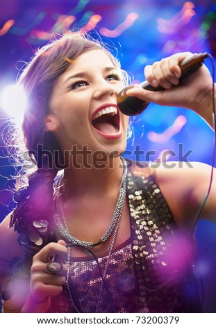 Pop Star With Mic On White Сток-фото © Pressmaster