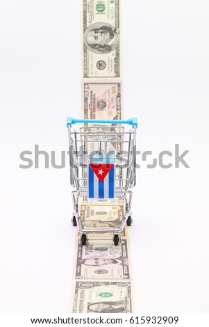 Сток-фото: Strip Of Different Us Dollar Banknotes And Empty Shopping Trolle