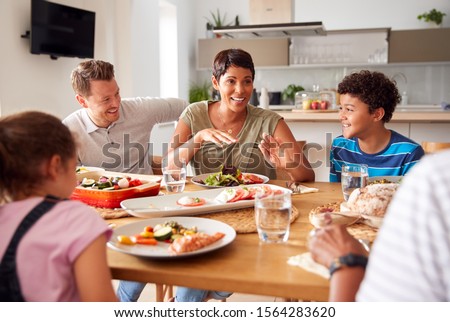 Stockfoto: Family Eating Dinner