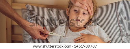 Stock photo: Sick Boy With Thermometer Laying In Bed And Father Hand Taking Temperature Father Checking Temperat