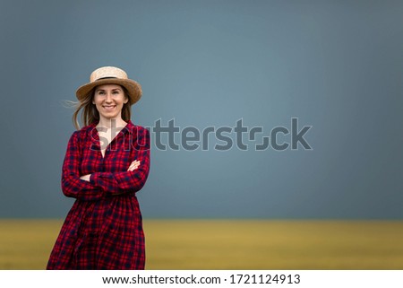 [[stock_photo]]: Female Farmer Standing On Fertile Agricultural Farm Land Soil