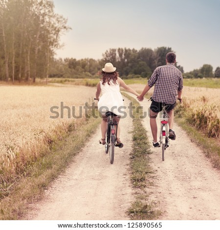 Stok fotoğraf: Young Romantic Couple Bonding Affectionatley Outdoors Scooter Mirror Reflects Them From Other Side