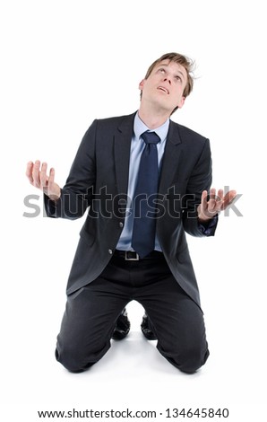 Foto stock: Prayer For Money Businessman Is Praying On His Knees To Dollar