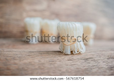 Stockfoto: Asian Uncooked Noodles Tied With Natural Rope Asian Food Concept