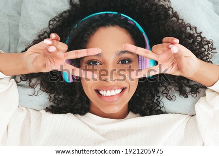 Stockfoto: Young Sexy Girl Lying On White Bed