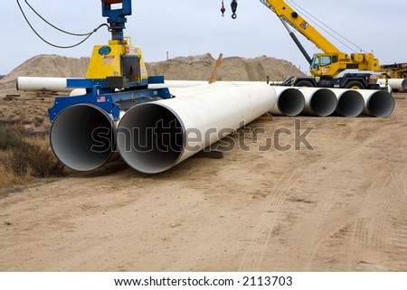 Stockfoto: Specialized Equipment For Placing Large Diameter Pipe In A Trenc