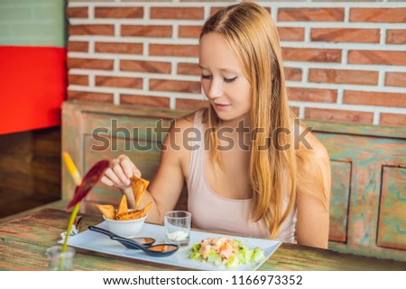 Stock fotó: Woman Eating At The Cafe Lifestyle The Dish Consists Of Salad Samosa And Several Kinds Of Sauces